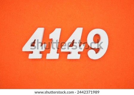 Orange felt is the background. The numbers 4149 are made from white painted wood.