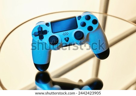Gamepad on abstract background with light effects. Gamer and Game concept. Gaming background with copy space