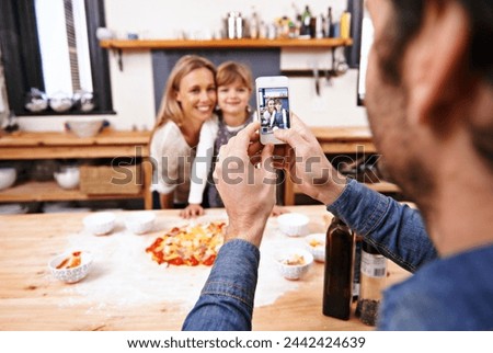 Happy family, phone and picture in kitchen for baking pizza together with parents in home. Photography, cooking and smile of mother, father and girl child on smartphone screen for bonding in house