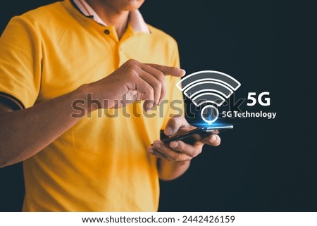It is a high-tech for men to use mobile phones to connect to the 5g network. Virtual Internet of Things is a kind of high-tech, and all devices are connected to and control the 5g high-speed Internet.