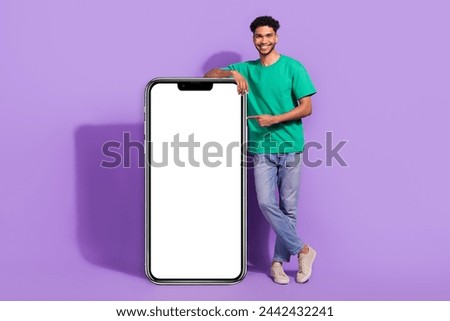 Full body photo of young promoter modern website for smartphone minimal interface direct finger new app isolated on purple color background