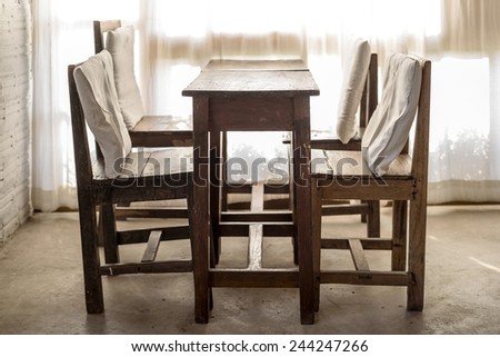 White room with wooden table and chair  , Vintage style