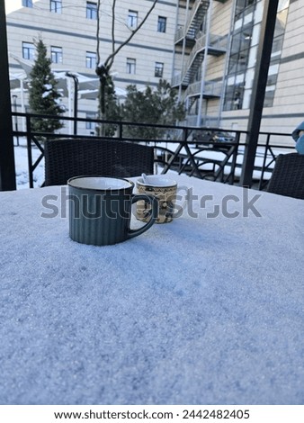 Panoramic picture of cold winter and hot coffee