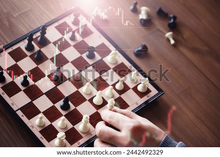 Hand playing game of chess, competition, strategy, battle