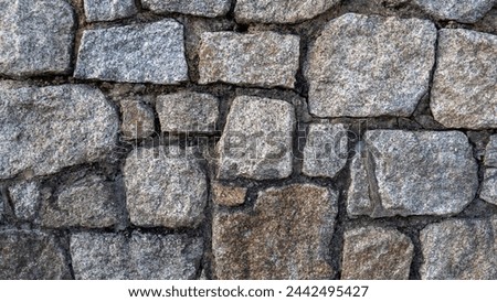 Stone wall - close up Royalty-Free Stock Photo #2442495427