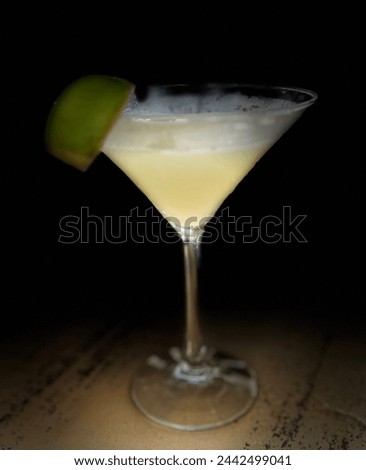 Handcrafted, colorful, unique cocktail. A mixologist’s masterpiece with exquisite sweet and aromatic garnish. A luxurious concoction that excites all of the senses in a stunning libation photograph. Royalty-Free Stock Photo #2442499041