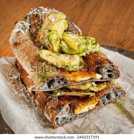 Genoese pizza on the wooden board Royalty-Free Stock Photo #2442517191