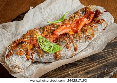Genoese pizza on the wooden board Royalty-Free Stock Photo #2442517193