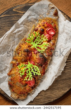 Genoese pizza on the wooden board Royalty-Free Stock Photo #2442517195
