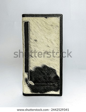 women's wallet crafted from premium black leather. March 24,2024, Punjab, Pakistan