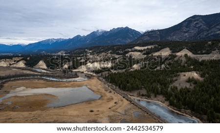 View of Rocky Mountains and wetlands in Radium Hot Springs, BC, Canada Royalty-Free Stock Photo #2442534579