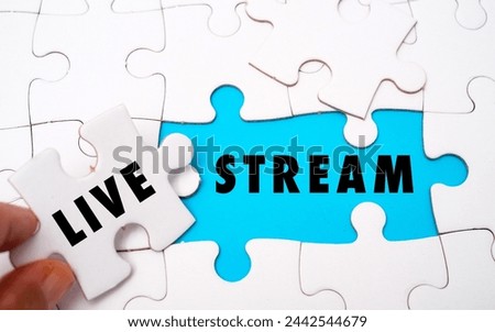 LIVE STREAM word alphabet letters on puzzle as a background