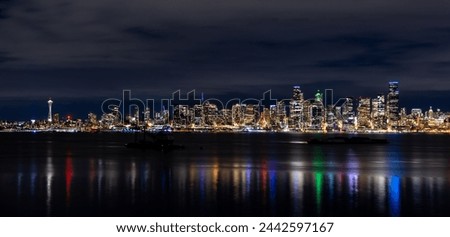 Seattle Skyline at night on Elliot Bay
