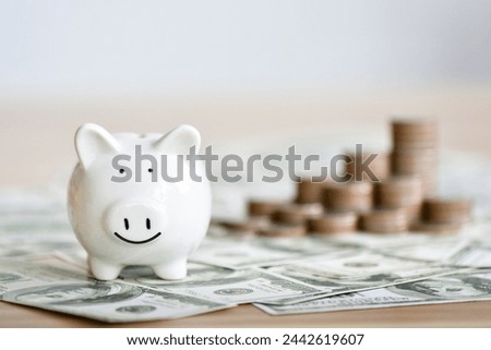 Money savings concepts Piggy bank symbol of saving with coins	