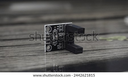The FC-33 10mm Arduino RPM Sensor is a magnetic induction sensor used for measuring rotational speed in RPM (Revolutions Per Minute).. Royalty-Free Stock Photo #2442621815