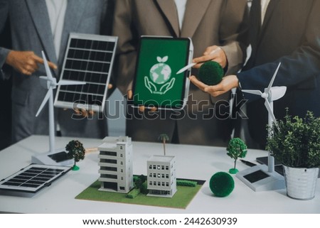 Carbon offset price report CO2 emission. Future growth Net zero waste in ESG ethical SME office protect climate change global warming social issues project. Group of asia people Eco friendly SDGs plan Royalty-Free Stock Photo #2442630939
