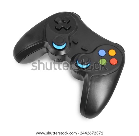 Black wireless controller on white background. Video game device