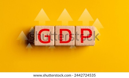 A wooden block with the letters G, D, and P on it. The block is red and white Royalty-Free Stock Photo #2442724535