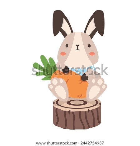 Bunny Rabbit sitting on Wood with carrot 