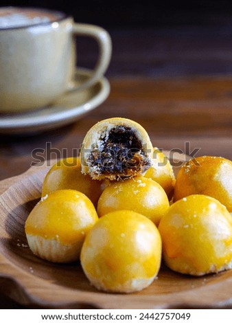 Pineapple tart is a small, bite-size tart filled or topped with pineapple.Nastar is a Dutch cake that has been modified to suit Indonesian creativity.  Pineapple comes from the Dutch word "Ananas". Royalty-Free Stock Photo #2442757049
