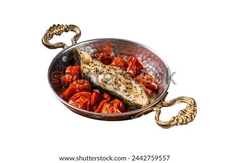 Fried halibut fish steaks with tomato in skillet.  Isolated on white background. Top view