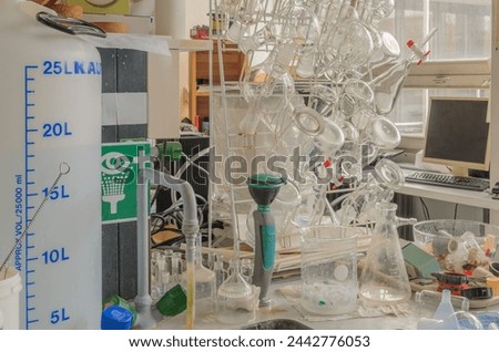 Lab Bench with Glassware and Computer