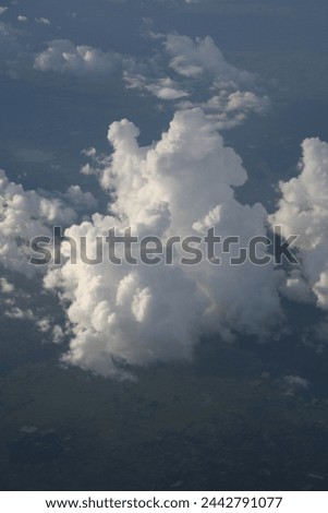 Exterior photo visual view of large cloudscape cloud clouds like cumulus cumulonimbus in the sky white nice ffluffy cotton resh wether view from aerial altitude