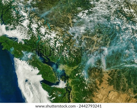 Fires in British Columbia. Fires in British Columbia. Elements of this image furnished by NASA. Royalty-Free Stock Photo #2442793241