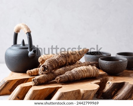 deodeok, mountain herb whose roots have restorative properties, Warm herbal tea Royalty-Free Stock Photo #2442799969