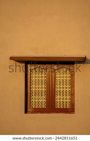windows in building plain wall background