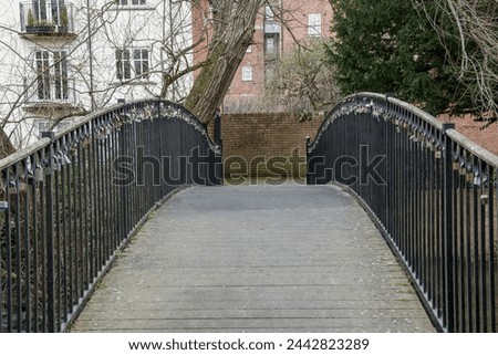 Salisbury England - March 10 2024: padlocks on a bridge overlooking the river a symbol of eternal love