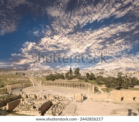 Forum (Oval Plaza) in Gerasa (Jerash), Jordan. Was built in the first century AD. Against the background of a beautiful sky with clouds.