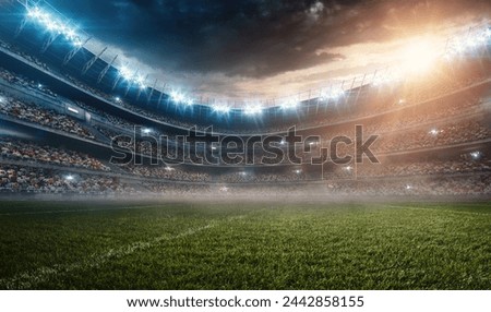 A wide angle panoramic image of a outdoor american football stadium full of spectators under evening sky. The image has depth of field with the focus on the foreground part of the pitch. Royalty-Free Stock Photo #2442858155