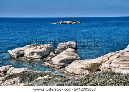 Distinctively layered limestone rocks at the coast of  the Coral Bay, Pegeia (Peyia), Paphos district, Cyprus
 Royalty-Free Stock Photo #2442903689