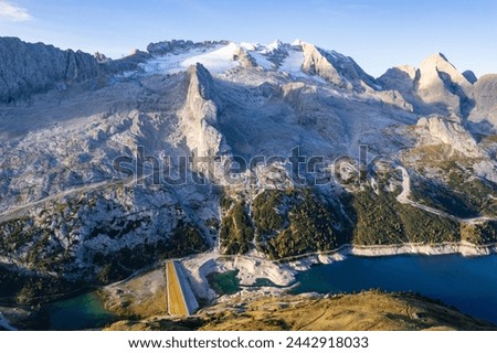 Sunrise aerial view of mount Marmolada and its glacier in the Dolomites Italy