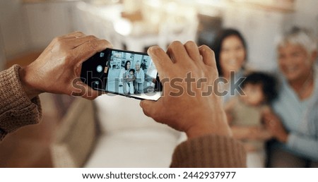 Phone screen, hands and picture of family in living room with smile, kids and grandparent on sofa. Social media, photo and mother with a baby and grandmother happy in a home together with love