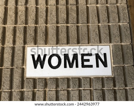 Women toilet sign. Retro, vintage sign for toilets. Old fashioned sign.