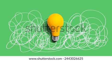 Clarifying complex ideas theme with light bulb - Flat lay Royalty-Free Stock Photo #2443026625