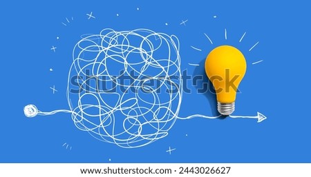 Clarifying complex ideas theme with light bulb - Flat lay Royalty-Free Stock Photo #2443026627