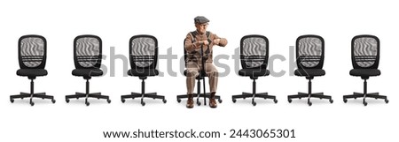 Empty office chairs and an elderly man sitting and checking his watch isolated on white background