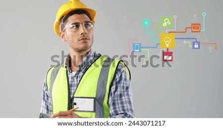 Image of digital interface showing linked media icons over male engineer wearing safety helmet and glasses writing on a clipboard. Global digital network concept digitally generated image.