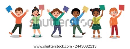 Group of little kids students holding books in their hands