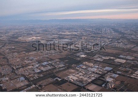 During the flight and before landing at the airport of Beijing city, the scenery around the city of the capital of China, Beijing