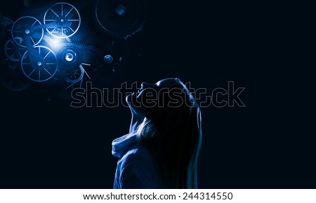 Cute girl of school age against night background