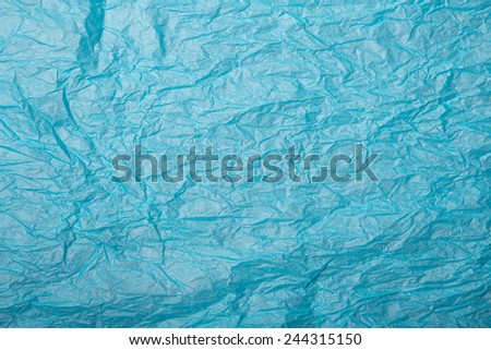 Crumpled paper texture, blue wrapping paper 