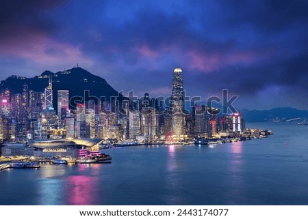 Crowded downtown and building in Hongkong Island during sunset in blue hour color mood