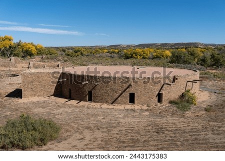 Great Kiva at Aztec Ruins National Monument in New Mexico. Best preserved Chacoan structures including Aztec West great house built by ancestral Pueblo people. Reconstructed kiva, religious site. Royalty-Free Stock Photo #2443175383