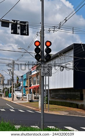 Three-stroke traffic light in Ribeirao Preto, Sao Paulo, Brazil Royalty-Free Stock Photo #2443200109