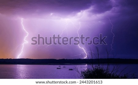 
 The lightning above ocean during night time  beautiful picture.
