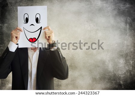 Businessman holding paper with face expression